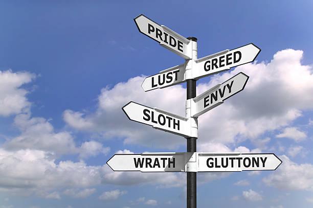 Seven dealdy sins signpost Concept image of a signpost with the seven deadly sins upon the arrows. proverbs bible stock pictures, royalty-free photos & images